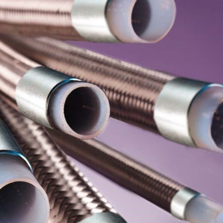 The image features a PTFE Smooth Bore Hose with a stainless steel braid for enhanced strength and chemical resistance.